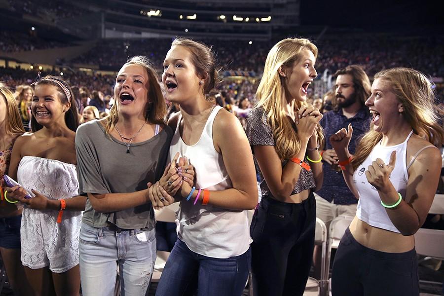 Fans get excited before the performance by One Direction at Soldier Field in Chicago on Sunday, Aug. 23, 2015. (Nuccio DiNuzzo/Chicago Tribune/TNS)