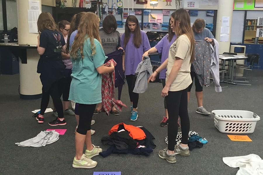 Seniors learned to sort laundry from Mrs. Collins in their Life Lessons workshops this past Wednesday.