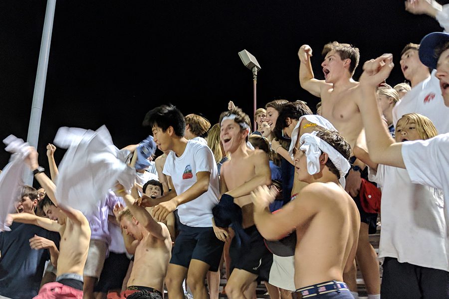 Falcon students cheer on their football team.