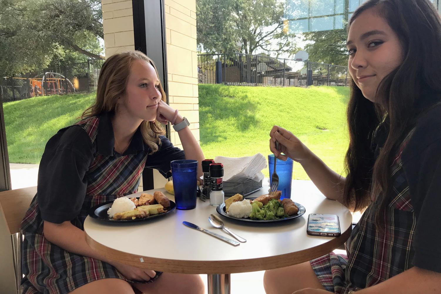 Seniors Virginia Sanders and Elena Casement eat lunch in the FDP. Seniors only have off campus privileges on Thursdays and Fridays.