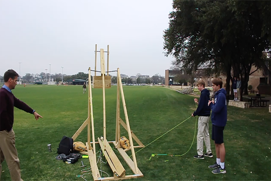 Aiden+Meeker+19+and+Dillon+Flynn+19+prepare+to+launch+their+catapult.