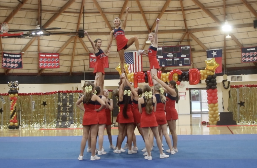 Cheerleaders performed a Hollywood-themed cheer routine at the pep rally.