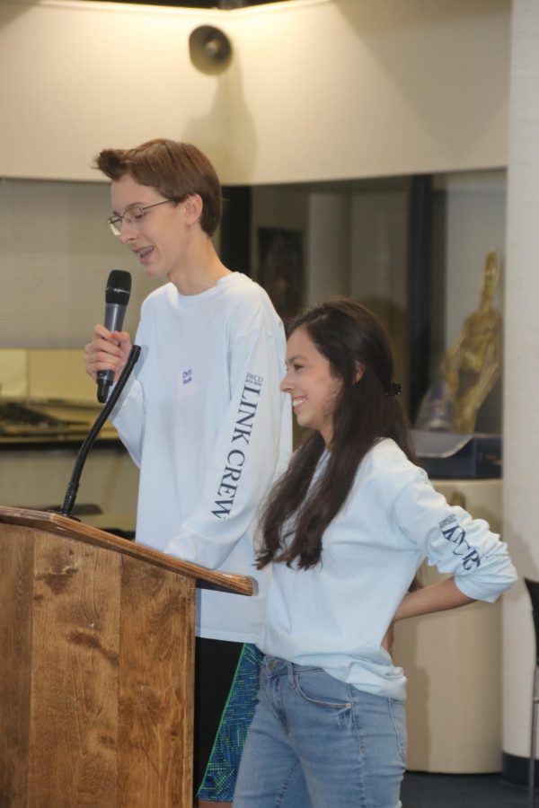 Christopher Hoppe 21 and classmate Paloma Casanova 21 lead the new student orientation in August.