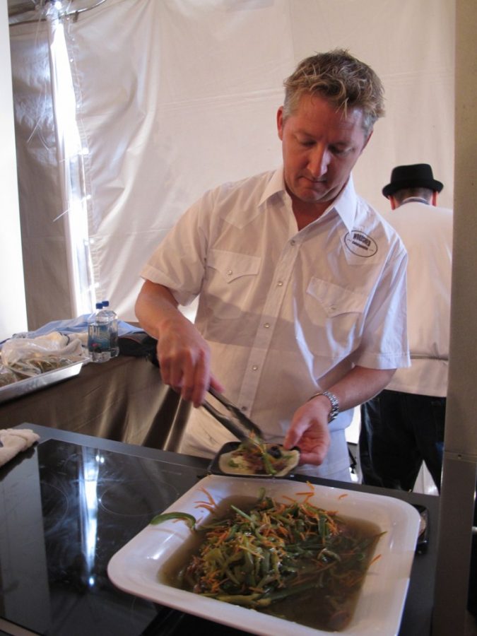 Chef Tim Love, owner of Burritos, Fajitas and Ritas, makes a taco. 