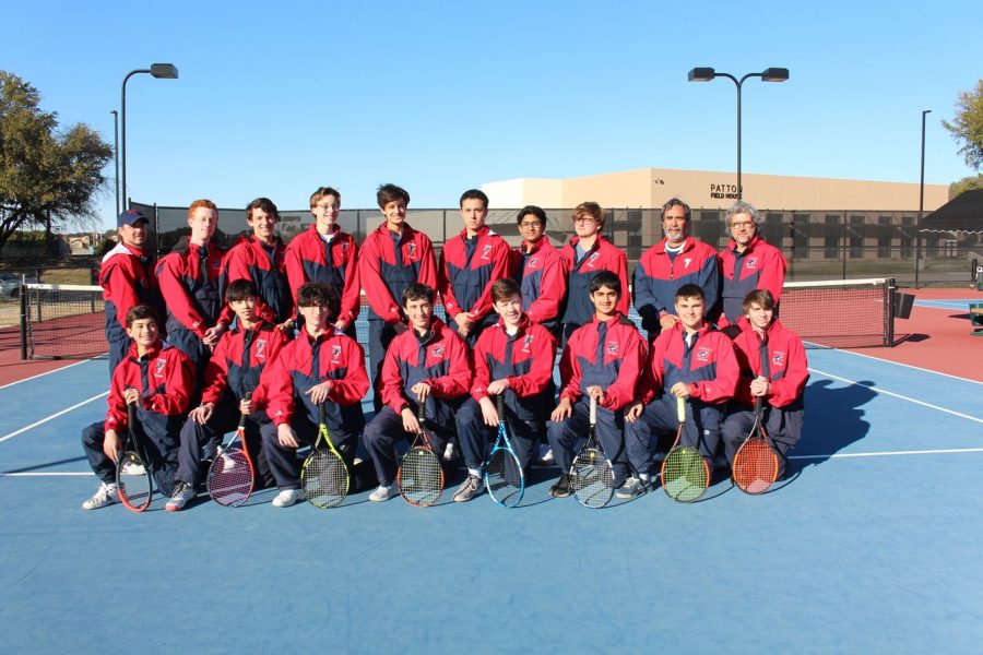 The FWCD boys varsity team poses for a team photo before the start of the tennis season.