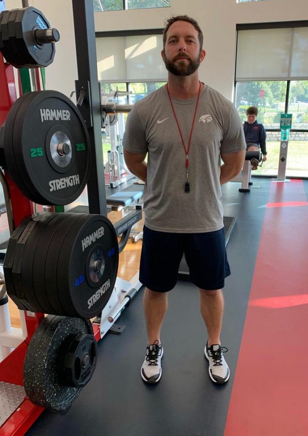 Shane Jenke prepares the weight room. 