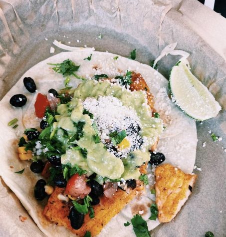 A Mr. Orange Taco on a flour tortilla from Torchy’s Tacos. Photo Courtesy of Mimi Cauble ‘23 and @yumi.ness on Instagram.