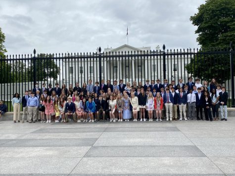 The Class of 2024 poses infant of the White House after their visit to the Capitol.