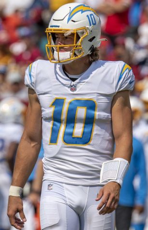 All-Pro Reels from District of Columbia, USA. Licensed under CC BY-SA 2.0. Justin Herbert, quarterback for the Los Angeles Chargers during a game against the Washington Football Team on September 12, 2021.