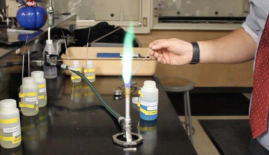 US science teacher Mark Lichaj burns Copper (II) Chloride.