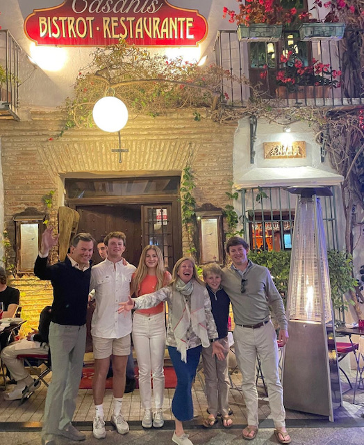 The+Crumley+Family+in+front+of+a+restaurant+in+Spain.