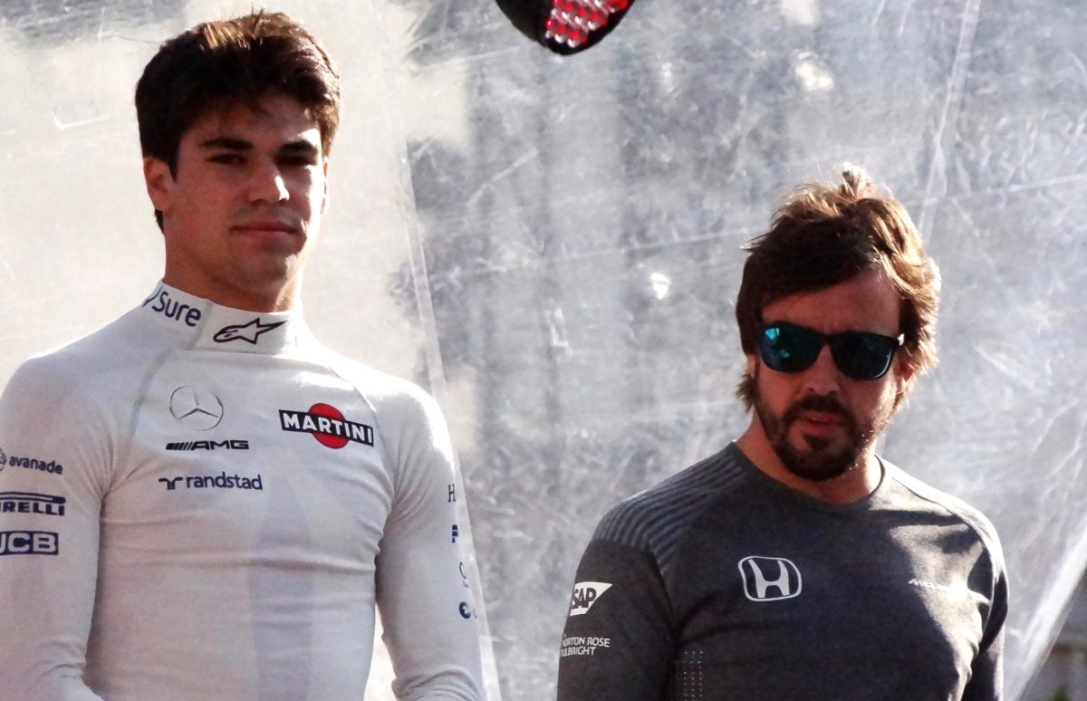 Lance+Stroll+%28left%29+stands+next+to+his+much+more+talented+teammate+Fernando+Alonso+%28right%29.
