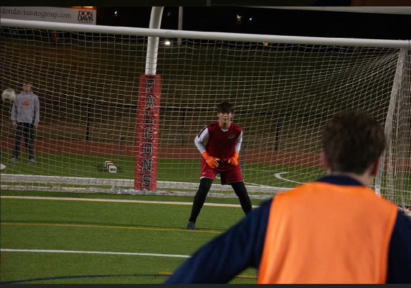 Jacob Dederick ready to save a goal for the Falcons.  