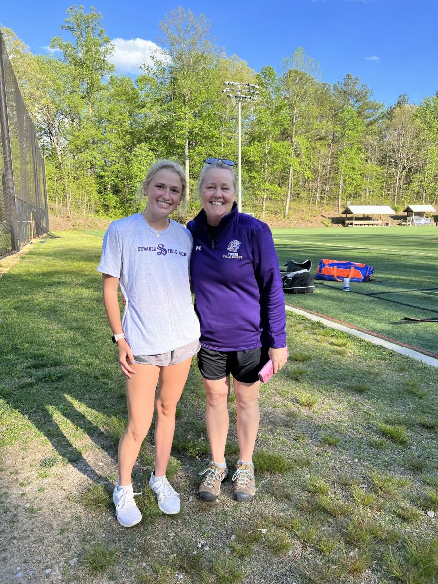 Kylie Carter stands with Head Field Hockey coach at Sewanee.