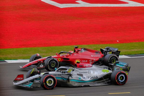 Lewis Hamilton battles for position over future teammate Charles Leclerc at Silverstone in 2022. This was before Hamilton made his announcement of the switch in the 2023 offseason.