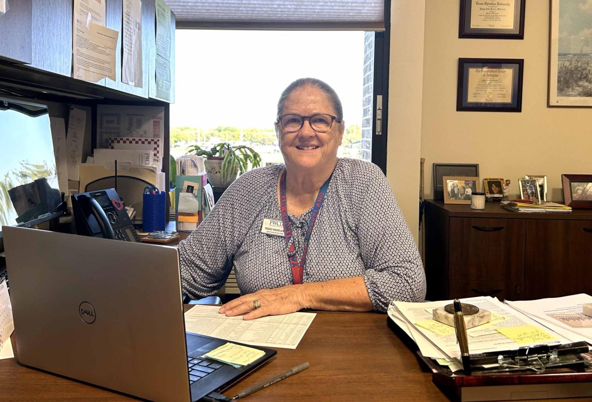 Wakeland at her desk doing her daily duties. 