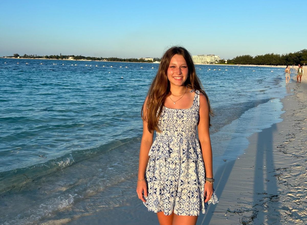 Taylor at a beach on a family vacation.