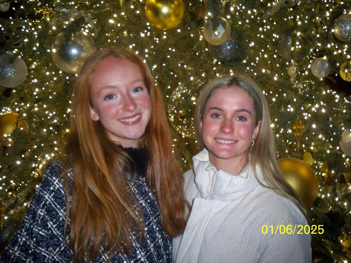 GiGi Helling '26 and Olivia Miller '26 celebrate the new year at the Adolphus Hotel's winter village.