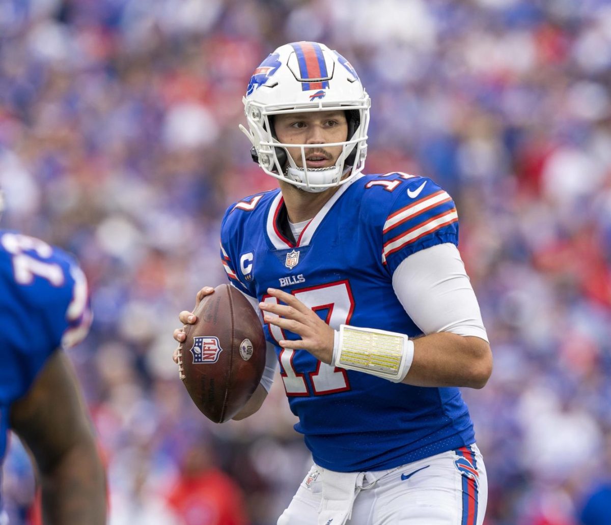Buffalo Bills quarterback, Josh Allen, in a game against the Washington Football Team at Highmark Stadium in Buffalo, NY on September 26, 2021. Photo taken by All-Pro Reels, via Flickr, licensed under Creative Commons Attribution-Share Alike 2.0 Generic. https://commons.wikimedia.org/wiki/File:Josh_Allen_SEPT2021.jpg

