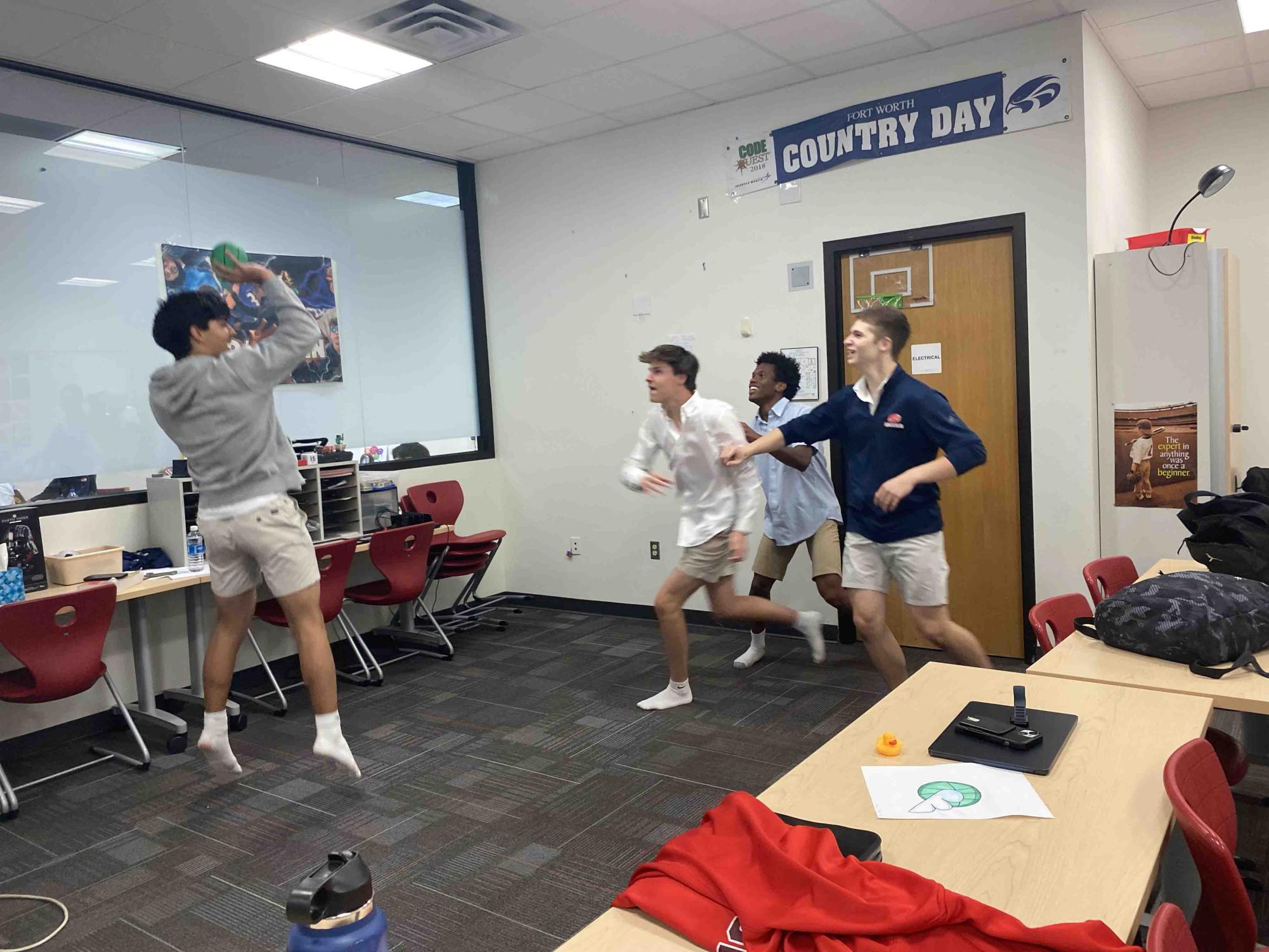 Talu Taflan '27 shoots a shot to win the game of Duckball.