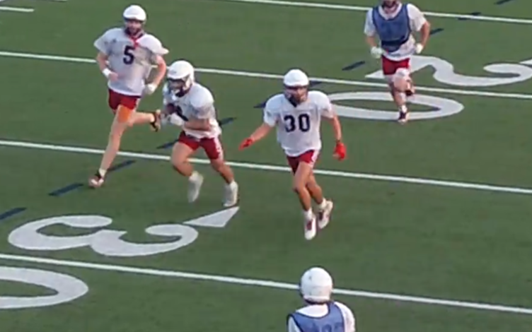 James Hanson '28 returns an interception during summer practice.