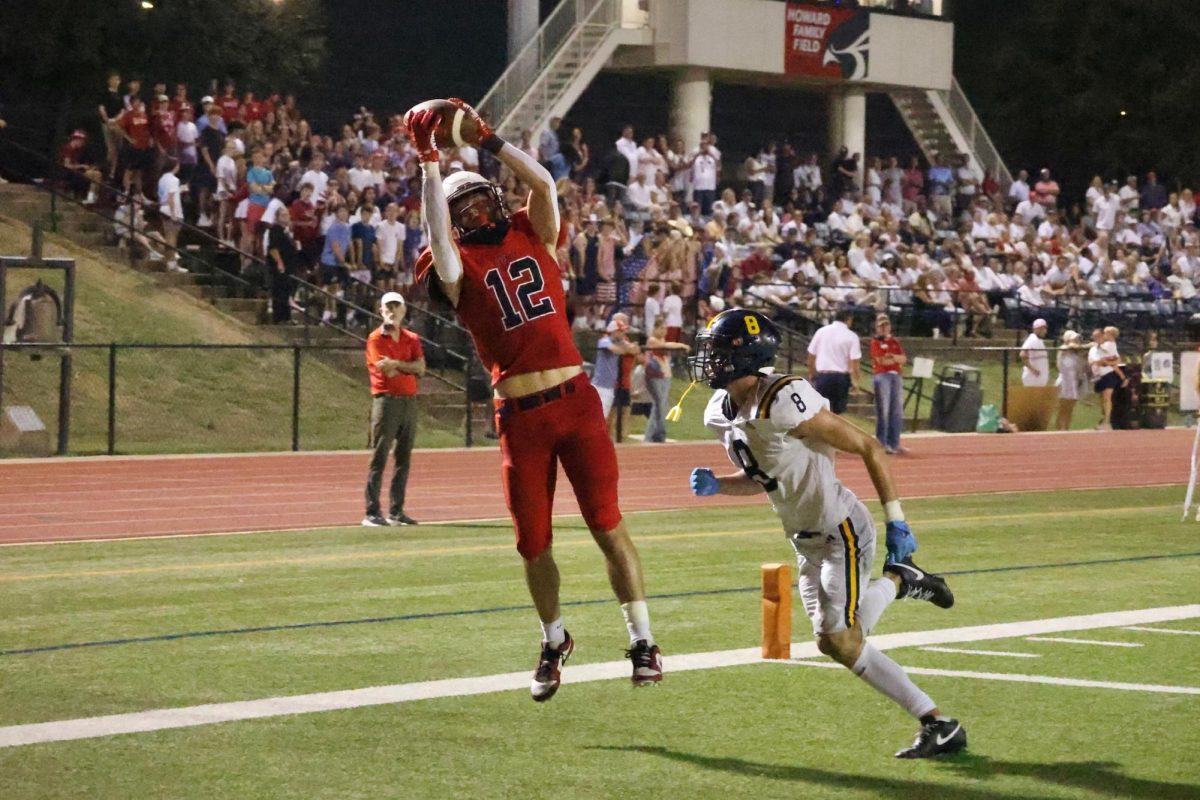 Canaan Factor '26 catches a pass from Hayes Casey '29 for a touchdown. 