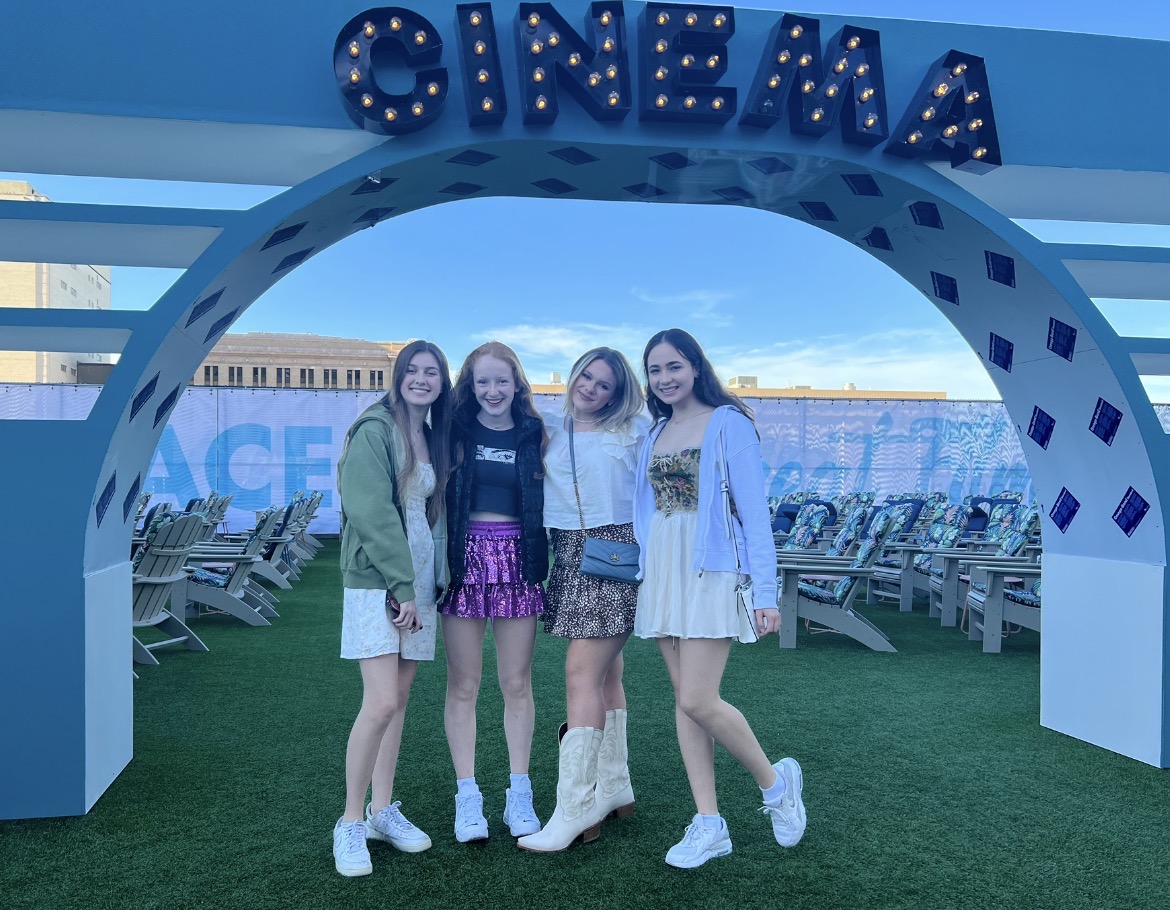 Bailey Flynn, GiGi Helling '26, Ashton Theesfeld '26, and Maya Marques '26 celebrate Theesfeld's 15th birthday at the Rooftop Cinema Club.