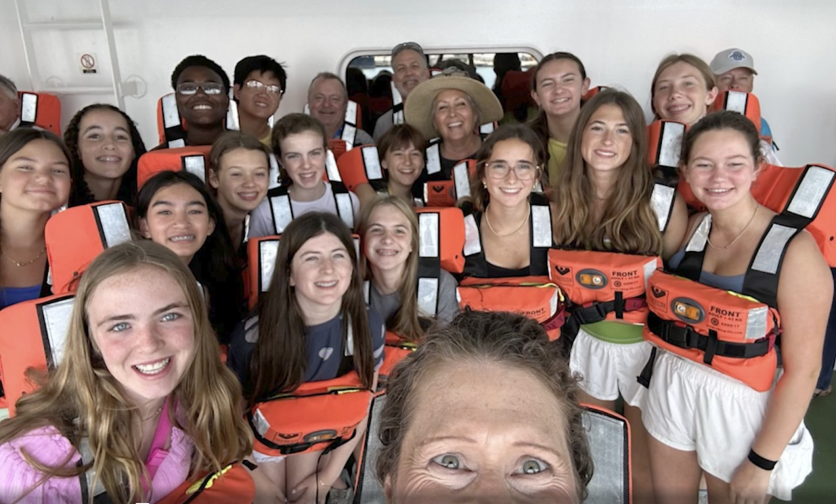 Middle school students review safety procedures on Greek Islands cruise ship. 
