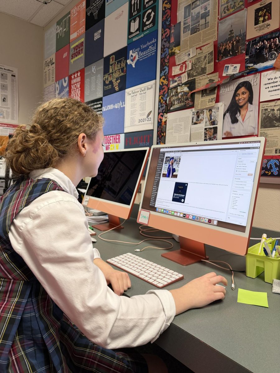 Evie Blan '27 working on her journalism story because her hobby is writing.
