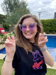 Emily Shideler looking snazzy with her TCU purple glasses.