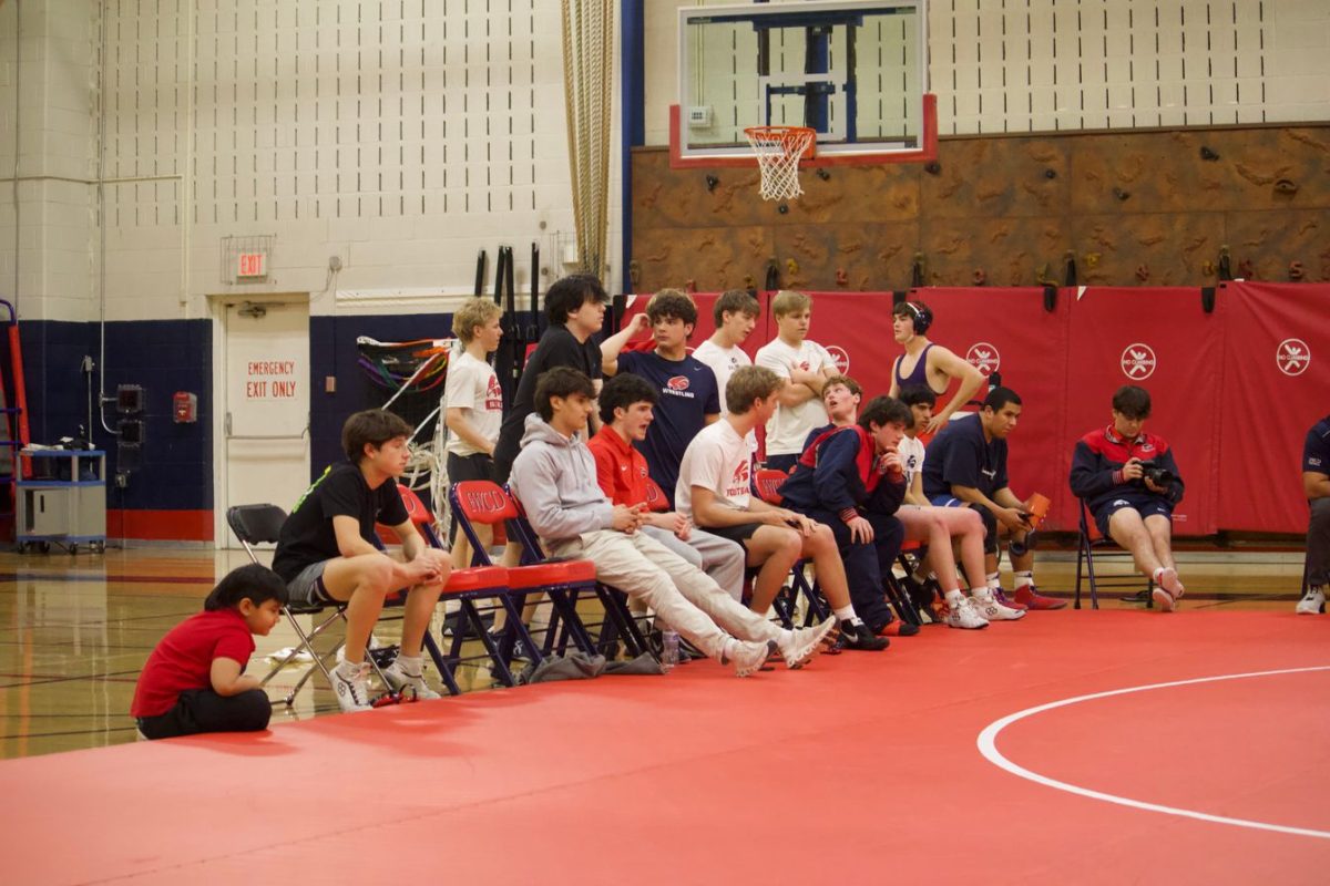 Wrestling team watches teammates wrestle in SPC.