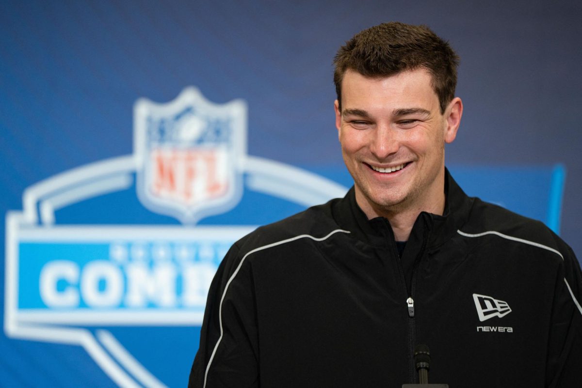 Feb 27, 2026; Indianapolis, IN, USA; Indiana quarterback Fernando Mendoza (QB11) speaks to members of the media during the NFL Combine at the Indiana Convention Center. Jacob Musselman-Imagn Images