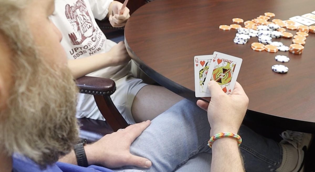 Lorenzo's winning poker hand strikes the final defeat for Blake. 
