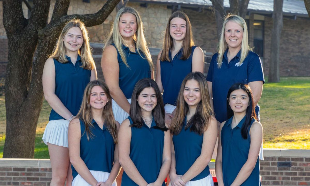 The FWCD Varsity Girls Golf team enjoys hanging out and laughing during practice.