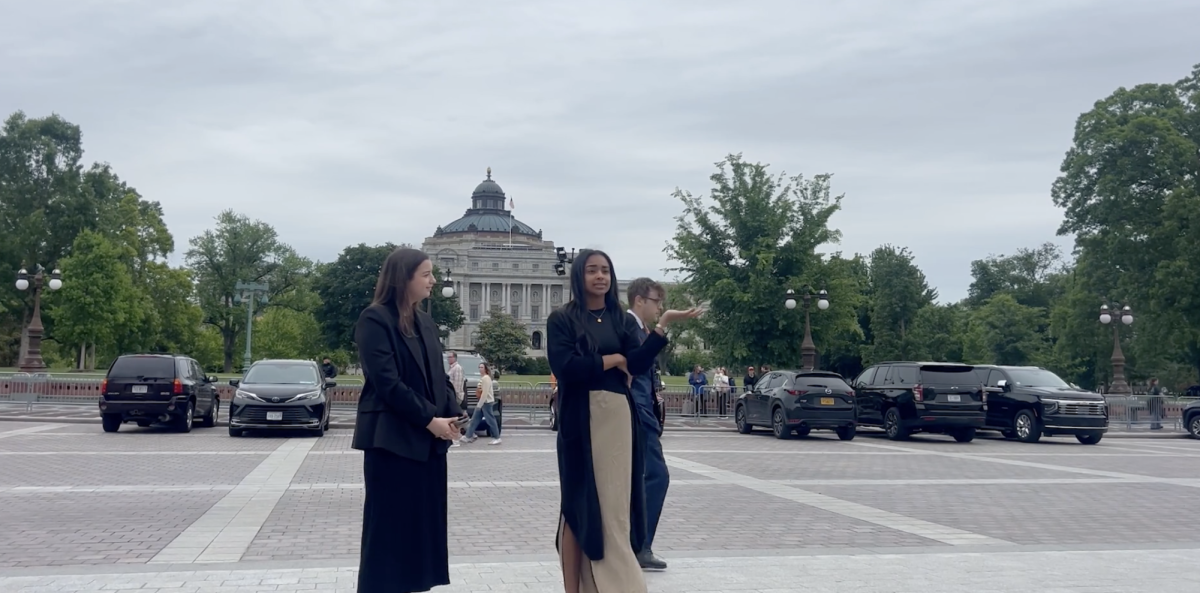 Two staffers from Congressman Marc Veasey's office speak to the FWCD sophomores on the Capitol steps.