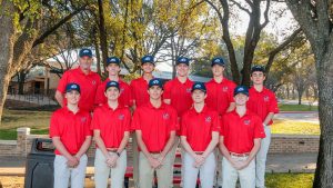 The FWCD Varsity Boys Golf team prepares to play.
